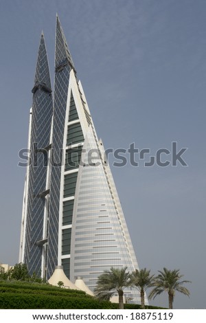 Bahrain  World Trade Center. Very modern and artful building that projected to supply its own energy consumption  via huge wind turbines.