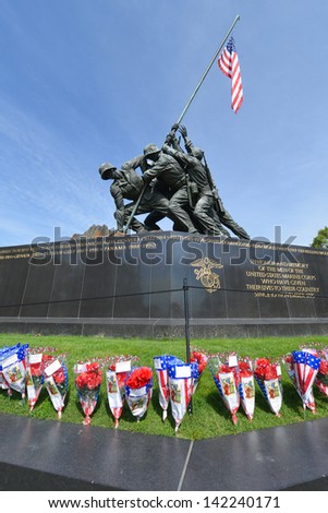 WASHINGTON DC - CIRCA MAY 2013: Iwo Jima Memorial circa May 2013 in Washington DC, USA. The Memorial framed with flower bouquets during Memorial Day week.