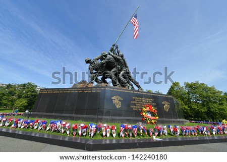 WASHINGTON DC - CIRCA MAY 2013: Iwo Jima Memorial circa May 2013 in Washington DC, USA. The Memorial framed with flower bouquets during Memorial Day week.