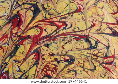 Traditional Turkish marbled paper artwork. Paper marbling is a method of water surface design, which can produce patterns similar to marble stone. Each pattern is unique due to nature of water