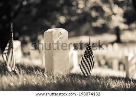 Arlington National Cemetery with a flag next to each headstone during Memorial day - Washington DC United States