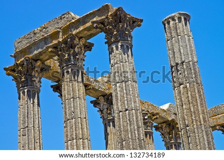 Ancient Roman building columns: detail of columns of ancient Roman building (Temple of Diana) in ruins in Evora, Portugal, with Corinthian style capitals.
