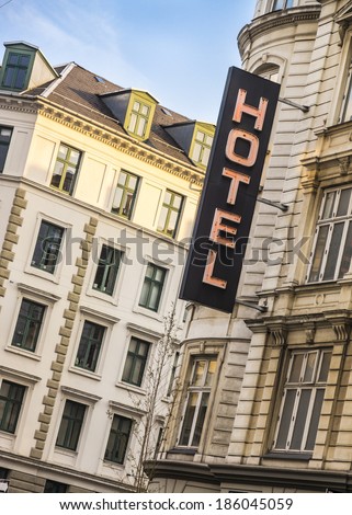 hotel neon sign in European capital city