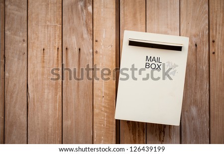 old mail box on the wooden wall