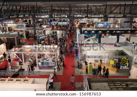 MILAN, ITALY - OCTOBER 3: Top view of booths and people at Made expo, international architecture and building trade show on OCTOBER 3, 2013 in Milan.