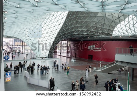 MILAN, ITALY - OCTOBER 3: Top view of people entering Made expo, international architecture and building trade show on OCTOBER 3, 2013 in Milan.