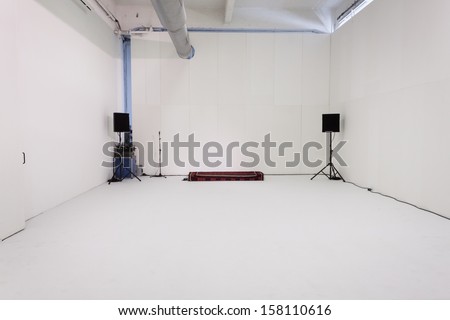 Empty yoga studio interior design, open space with mats, pillows and  accessories, parquet, patio house, inner garden with tree and pebbles,  ready for yoga practice, meditation room - Stock Image - Everypixel