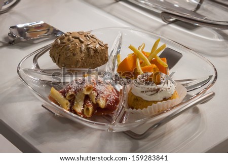 MILAN, ITALY - OCTOBER 18: Food in a dish at Host 2013, international exhibition of the hospitality industry on OCTOBER 18, 2013 in Milan.