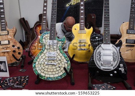 MILAN, ITALY - OCTOBER 20: Electric guitars at Milano Guitars & Beyond 2013, important trade show of string instruments with specific attention to guitars on OCTOBER 20, 2013 in Milan.