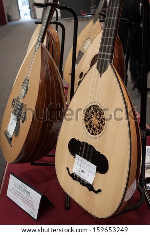 MILAN, ITALY - OCTOBER 20: Mandoloncello on display at Milano Guitars & Beyond 2013, important trade show of string instruments with specific attention to guitars on OCTOBER 20, 2013 in Milan.