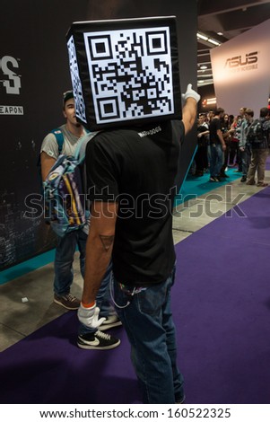 MILAN, ITALY - OCTOBER 26: Qr code head man at Games Week 2013, event dedicated to video games and electronic entertainment on OCTOBER 26, 2013 in Milan.