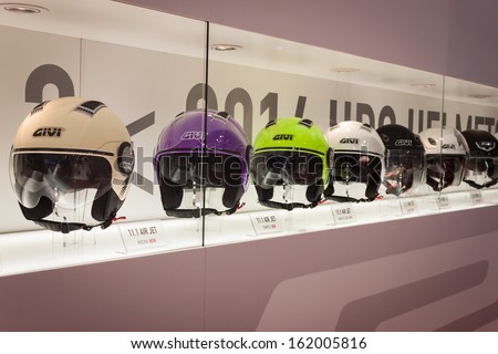 MILAN, ITALY - NOVEMBER 5: Motorcycle helmets on display at EICMA, international motorcycle exhibition on NOVEMBER 5, 2013 in Milan.