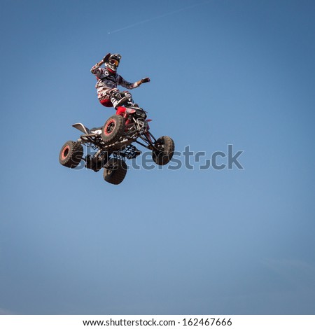 Milan, Italy - November 7: Freestyle Pilot Performs A High Jump With Trick At Eicma, International Motorcycle Exhibition On November 7, 2013 In Milan.