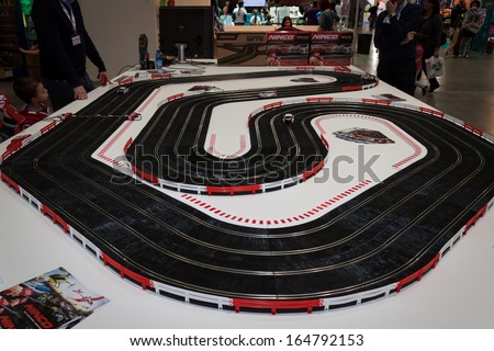 MILAN, ITALY - NOVEMBER 22: Car track at G! come giocare, trade fair dedicated to games, toys and children on NOVEMBER 22, 2013 in Milan.