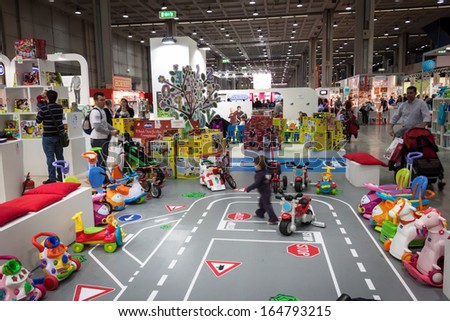 MILAN, ITALY - NOVEMBER 22: People visit G! come giocare, trade fair dedicated to games, toys and children on NOVEMBER 22, 2013 in Milan.