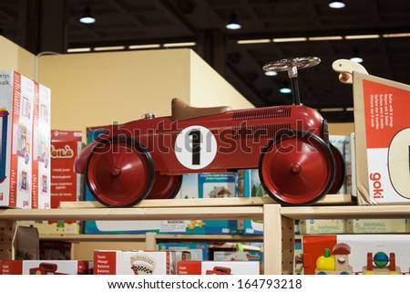 MILAN, ITALY - NOVEMBER 22: Vintage toy car at G! come giocare, trade fair dedicated to games, toys and children on NOVEMBER 22, 2013 in Milan.