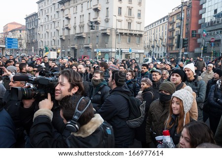 MILAN, ITALY - DECEMBER 11: Demonstrators occupy the city streets blocking the traffic to protest against government and politicians on DECEMBER 11, 2013 in Milan.