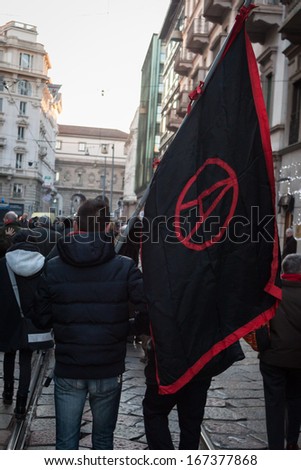 MILAN, ITALY - DECEMBER 14: People participate in an antifascist march to celebrate piazza Fontana bombing anniversary on DECEMBER 14,2013 in Milan.