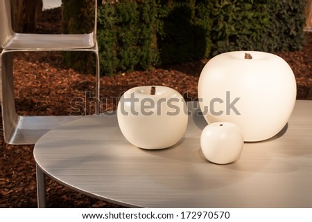 MILAN, ITALY - JANUARY 20: White giant apples on display at HOMI, home international show and point of reference for all those in the sector of interior design on JANUARY 20, 2014 in Milan.