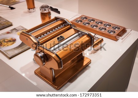MILAN, ITALY - JANUARY 20: Pasta machine on display at HOMI, home international show and point of reference for all those in the sector of interior design on JANUARY 20, 2014 in Milan.