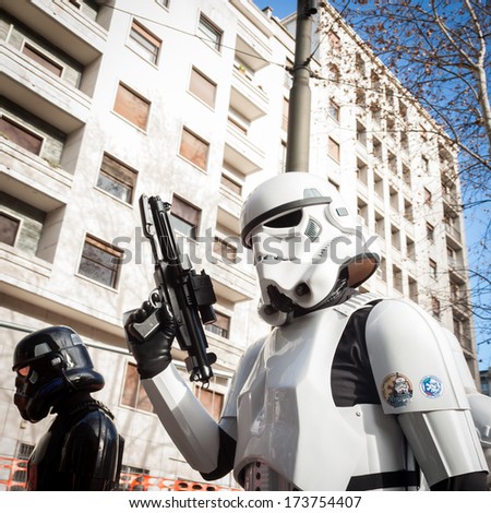 MILAN, ITALY - JANUARY 26: People of 501st Legion, official costuming organization, take part in the Star Wars Parade wearing perfectly accurate costumes on JANUARY 26, 2013 in Milan.