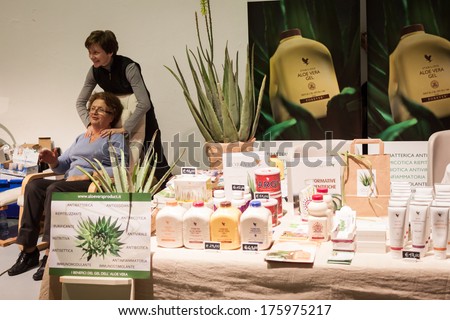 MILAN, ITALY - FEBRUARY 7: People visit Olis Festival, event dedicated to holistic disciplines, alternative medicine and natural food on FEBRUARY 7, 2014 in Milan.