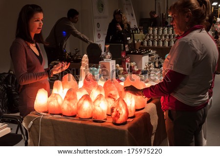 MILAN, ITALY - FEBRUARY 7: Stone lamps on sale at Olis Festival, event dedicated to holistic disciplines, alternative medicine and natural food on FEBRUARY 7, 2014 in Milan.