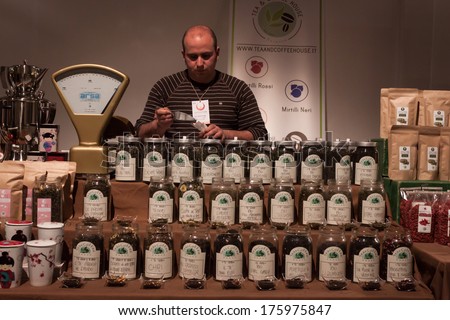 MILAN, ITALY - FEBRUARY 7: Jars with different types of tea on sale at Olis Festival, event dedicated to holistic disciplines, alternative medicine and natural food on FEBRUARY 7, 2014 in Milan.