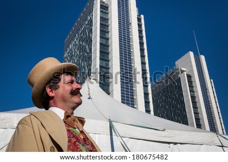 MILAN, ITALY - MARCH 6: Performer poses outside the big top at Milan Clown Festival, international event dedicated to clowns and street theatre on MARCH 6, 2014 in Milan.