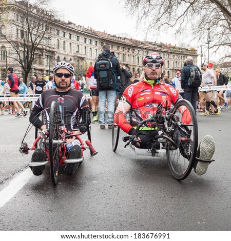 MILAN, ITALY - MARCH 23: Disabled athletes take part in Stramilano, traditional half marathon through the city streets on MARCH 23, 2014 in Milan.