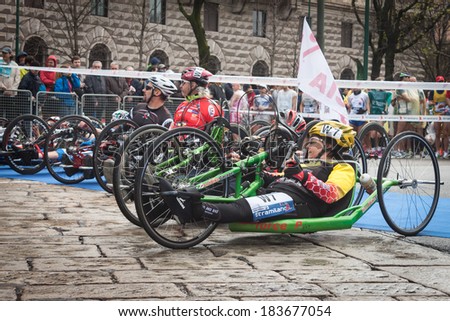 MILAN, ITALY - MARCH 23: Disabled athletes take part in Stramilano, traditional half marathon through the city streets on MARCH 23, 2014 in Milan.