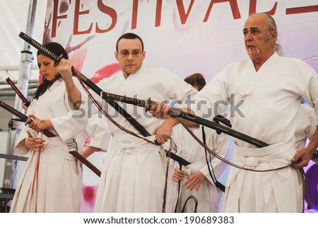 MILAN, ITALY - APRIL 27: Katana sword fighters at Orient Festival, event dedicated to Oriental culture and traditions on APRIL 27, 2014 in Milan.