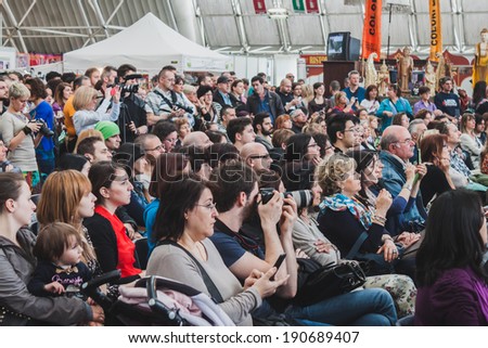 MILAN, ITALY - APRIL 27: People visit Orient Festival, event dedicated to Oriental culture and traditions on APRIL 27, 2014 in Milan.