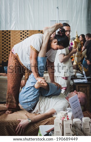 MILAN, ITALY - APRIL 27: Thai massage at Orient Festival, event dedicated to Oriental culture and traditions on APRIL 27, 2014 in Milan.