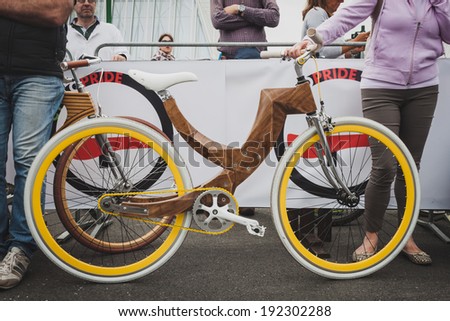 MILAN, ITALY - MAY 11: Wooden bicycle at Cyclopride, event dedicated to bicycles and sustainable mobility on MAY 11, 2014 in Milan.
