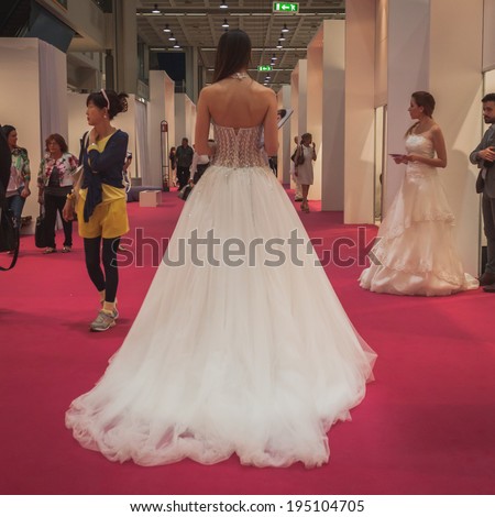 MILAN, ITALY - MAY 23: Model wears wedding dresses at Si\' Sposaitalia, ultimate exhibition for bridal and formal wear industry on MAY 23, 2014 in Milan.