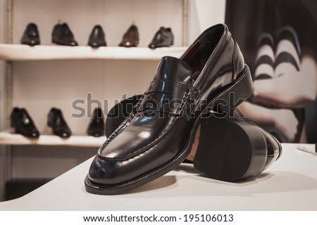 MILAN, ITALY - MAY 23: Elegant men shoes on display at Si\' Sposaitalia, ultimate exhibition for bridal and formal wear industry on MAY 23, 2014 in Milan.