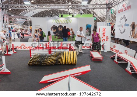 MILAN, ITALY - JUNE 7: Dog course at Quattrozampeinfiera, event and activities dedicated to dogs, cats and their owner on JUNE 7, 2014 in Milan.