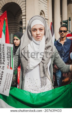 MILAN, ITALY - JULY 26: People march and protest against Gaza strip bombing in solidarity with Palestinians on JULY 26, 2014 in Milan.