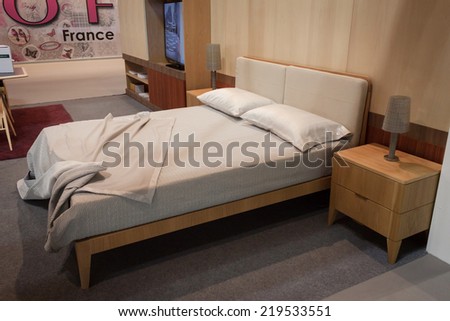 MILAN, ITALY - SEPTEMBER 13: Double bed on display at HOMI, home international show and point of reference for all those in the sector of interior design on SEPTEMBER 13, 2014 in Milan.
