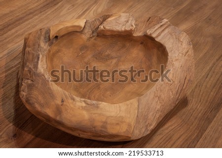 MILAN, ITALY - SEPTEMBER 13: Wooden ashtray on display at HOMI, home international show and point of reference for all those in the sector of interior design on SEPTEMBER 13, 2014 in Milan.