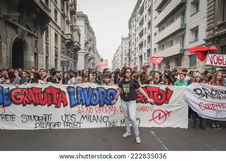 MILAN, ITALY - OCTOBER 10: Thousands of students march in the city streets to protest against the money cuts in the public school on OCTOBER 10, 2014 in Milan.