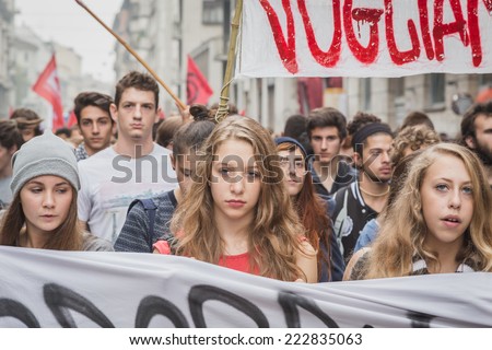 MILAN, ITALY - OCTOBER 10: Thousands of students march in the city streets to protest against the money cuts in the public school on OCTOBER 10, 2014 in Milan.