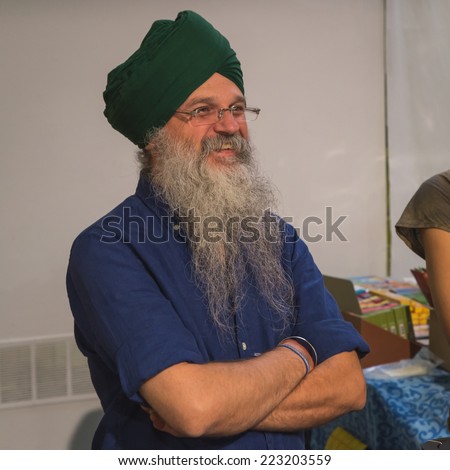 MILAN, ITALY - OCTOBER 10: Bearded man at Yoga Festival, event dedicated to yoga, meditation and healthy lifestyle on OCTOBER 10, 2014 in Milan.