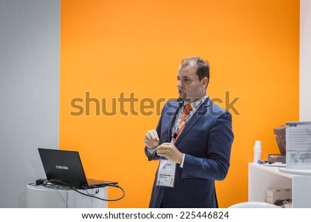 MILAN, ITALY - OCTOBER 22: Man talks at Smau, international exhibition of information communications technology on OCTOBER 22, 2014 in Milan.