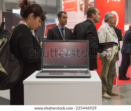 MILAN, ITALY - OCTOBER 22: Fujitsu stand at Smau, international exhibition of information communications technology on OCTOBER 22, 2014 in Milan.