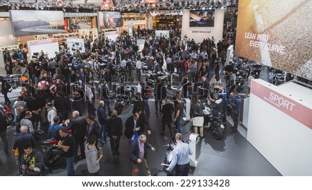 MILAN, ITALY - NOVEMBER 5: People visit EICMA, international motorcycle exhibition on NOVEMBER 5, 2014 in Milan.