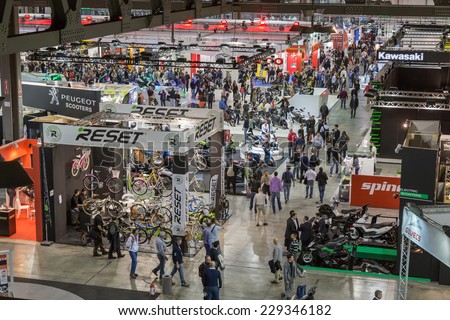 MILAN, ITALY - NOVEMBER 5: Top view of people and booths at EICMA, international motorcycle exhibition on NOVEMBER 5, 2014 in Milan.