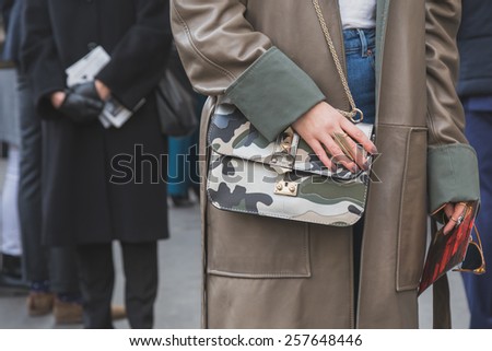 MILAN, ITALY - MARCH 1: Detail of bag outside Ferragamo fashion show building for Milan Women\'s Fashion Week on MARCH 1, 2015  in Milan.