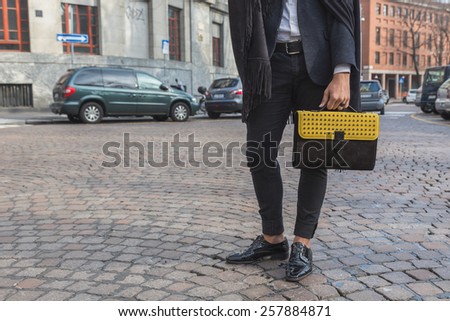 MILAN, ITALY - MARCH 2: Detail of bag outside Alberto Zambelli fashion show building for Milan Women\'s Fashion Week on MARCH 2, 2015  in Milan.